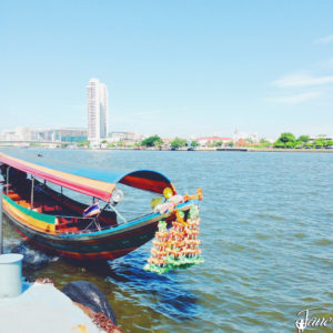 Small teak canal boat for the river canal tour